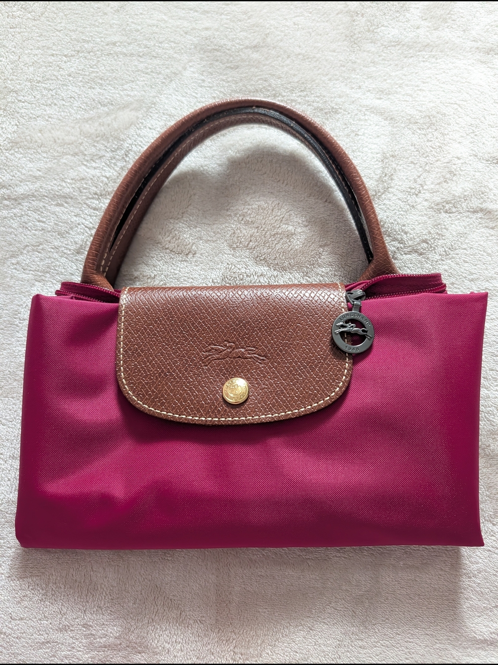 Medium Longchamp Bag in Magenta with Brown Trim And Top Handle